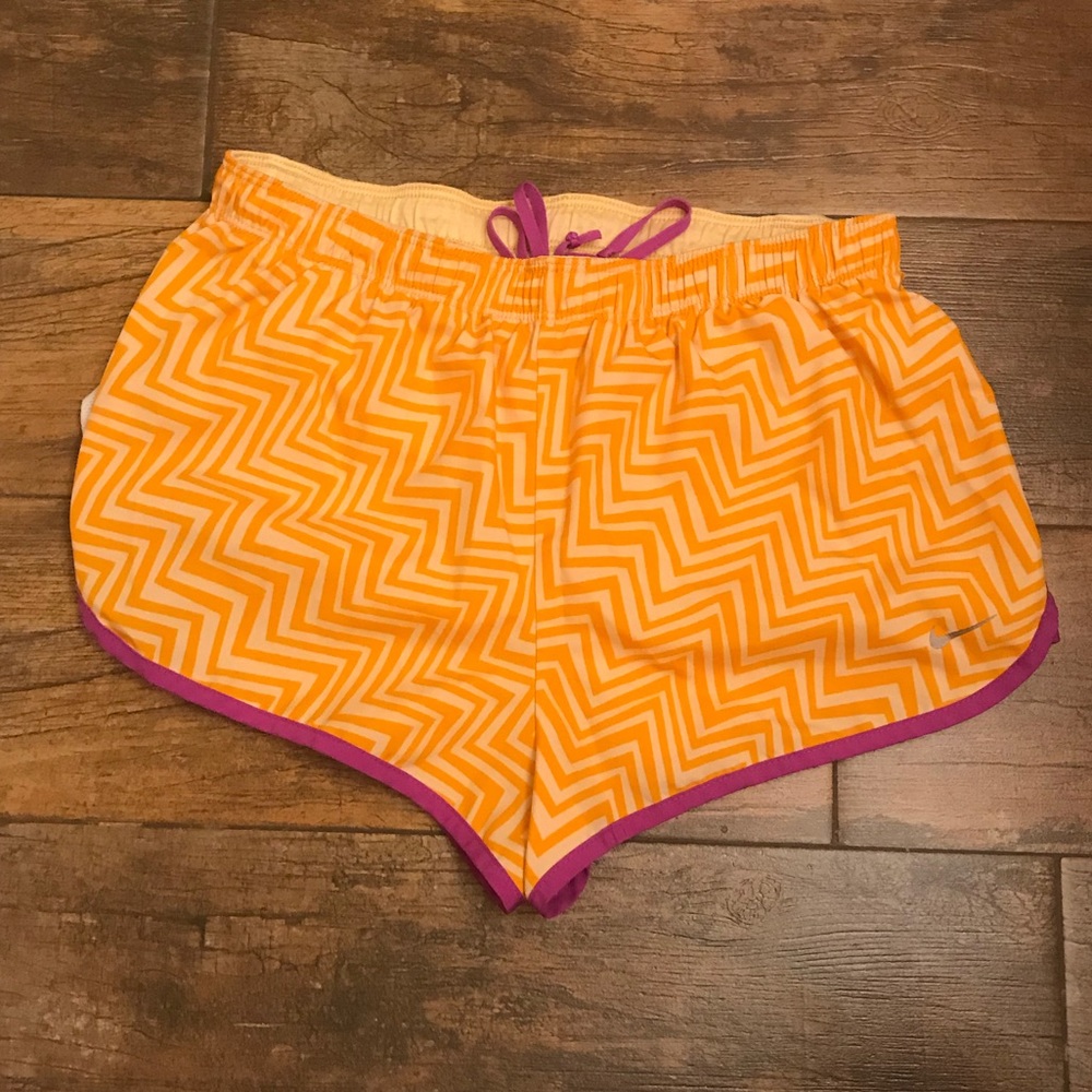 Orange Nike shorts Dri-Fit